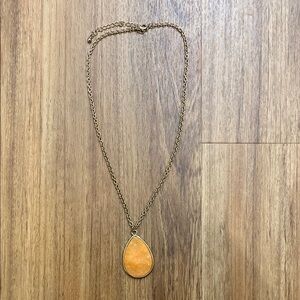 Gold and Orange Pendant Necklace with Elegant Design